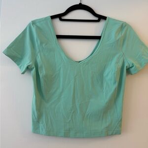 Lululemon Athletica Light Green Short Sleeve Top